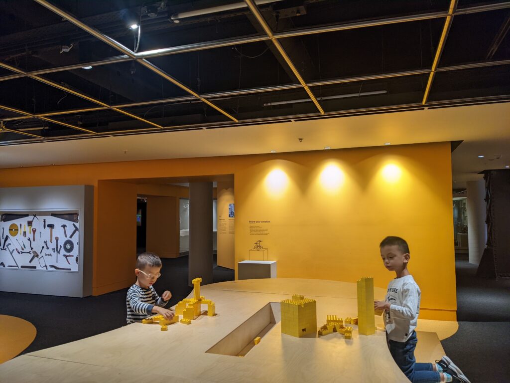 Children playing in an interactive experience at a Sydney museum.
